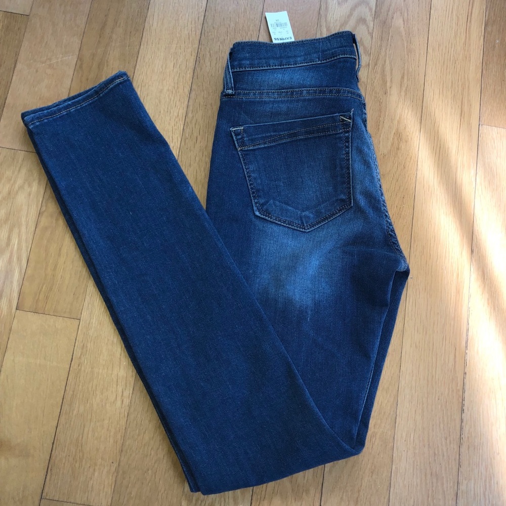 New express size 0 mid rise super skinny jeans